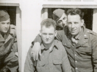 Everybody crashing the picture. Burton McKenzie, Orr, Stanley Gemzala, Joe Samaha in the back. (Co. C, 634th TD Bn).  [Photo courtesy of Mike Getten, son of Jean Getten and nephew of Lynes Getten; both 634th TDBn soldiers] : Burton McKenzie, Orr, Stanley Gemzala, Joe Samaha, Company C, 634th Tank Destroyer Battallion.