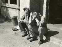John Arnquist and John Larson, just sitting and sunning on the front steps, England, May 1944.  (Co. C, 634th TD Bn).  [Photo courtesy of Mike Getten, son of Jean Getten and nephew of Lynes Getten; both 634th TDBn soldiers] : John Arnquist and John Larson, Company C, 634th Tank Destroyer Battallion.