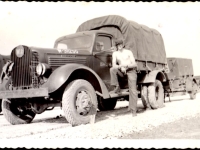 PVT F.G. Carlson with his vehicle at Camp Claiborne, Louisiana.  [Photo courtesy of Mike Getten, son of Jean Getten and nephew of Lynes Getten; both 634th TDBn soldiers] : 634th TDBn, Tank Destroyers, Camp Claiborne, 151st FA, Minnesota National Guard, F.G. Carlson
