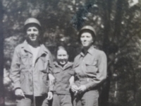 This photo was taken in Karsbad, Czechoslovakia where Russian and American soldiers met. The girl was a Russian nurse. They were stationed there over a month. [Photo courtesy of Iris Csimbok, daughter of George Kahora, Recon Co.]