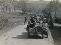 George Kahora on jeep on last recon mission. He just came out of the hospital the day before. Czechoslovakia, last days of war. [Photo courtesy of Iris Csimbok, daughter of George Kahora, Recon Co.]