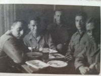 Germany. Italian GI's held a spaghetti dinner. George Kahora far right. First time he ever had spaghetti! [Photo courtesy of Iris Csimbok, daughter of George Kahora, Recon Co.]