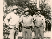"Lt. Col. Davisson CO. Boys Who received silver star"  [Photo courtesy of John McCormick, Jr.] Note: Soldiers identified by corresponding photographs in the Olson Photo Album. Sgt Anderson is in the middle; Sgt Doran is on the right.