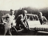 "Clemons, Skaggs, ?,  just washed Jeep" [Courtesy of Cpl Howard Skaggs, Co. A, 634th TD Bn.]