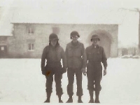 "Howard, Roecher, & Brokow in Buttenbach" [Courtesy of Cpl Howard Skaggs, Co. A, 634th TD Bn.]