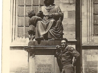 Unidentified friend of Cpl L. W. Hansman.  [Photo courtesy of Brenda Daas, niece of Cpl L. W. Hansman]  Note: The statue is a monument to the priest and writer Christoph von Schmid (1768-1854) outside St. George's Church, Dinkelsbühl, Germany where the unit spent the postwar summer of 1945.
