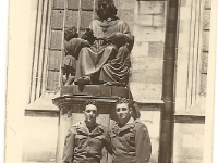 Cpl Leonard W. Hansman, 634th Tank Destoyer Bn., on right. Unidentified buddy from Los Angeles on the left.  [Photo courtesy of Brenda Daas, niece of L. W. Hansman]  Note: The statue is a monument to the priest and writer Christoph von Schmid (1768-1854) outside St. George's Church, Dinkelsbühl, Germany where the unit spent the postwar summer of 1945.