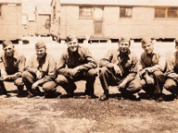"Walsh 2nd from end on right - others unknown. Basic training Ft McClellan AL"  - Photo courtesy of Kelsey and Megan Walsh, granddaughters of James Walsh (Co. A/HQ Co).