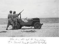 "This is a .50 cal M. Gun firing at a towed target (pulled by airplane). Taken at Camp Hulen, Tex. on the Gulf. We sent 207 men and 7 officers to a week school there last month." - Photo courtesy of Jay Olson, son of Maj Errol B. Olson