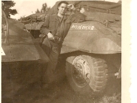 GrampswithM8  SSG Charles McIntyre of the Recon Co. alongside an M8.[Photo courtesy of Kelly Guenon, grandson]