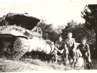 tank buddies and Leonard  Cpl Leonard W. Hansman on right with unidentified buddies. [Photo courtesy of Brenda Daas, niece of L. W. Hansman]